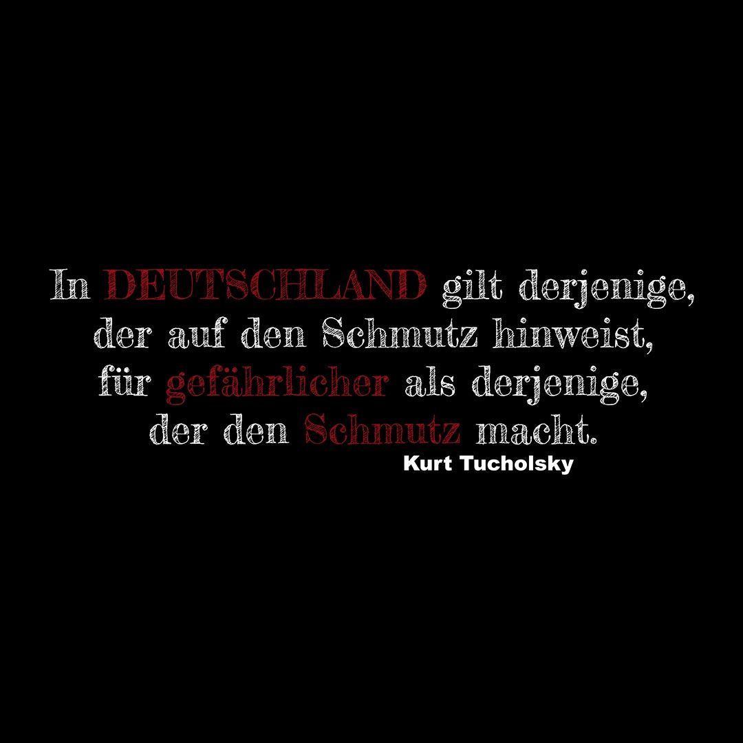Latzschürze, schwarz, "In Deutschland..."